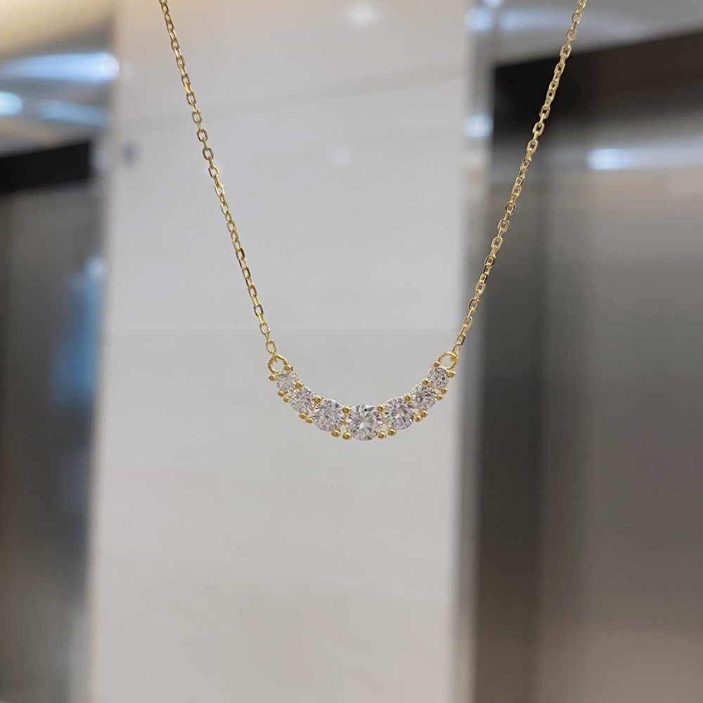 Necklace with zirconia design around